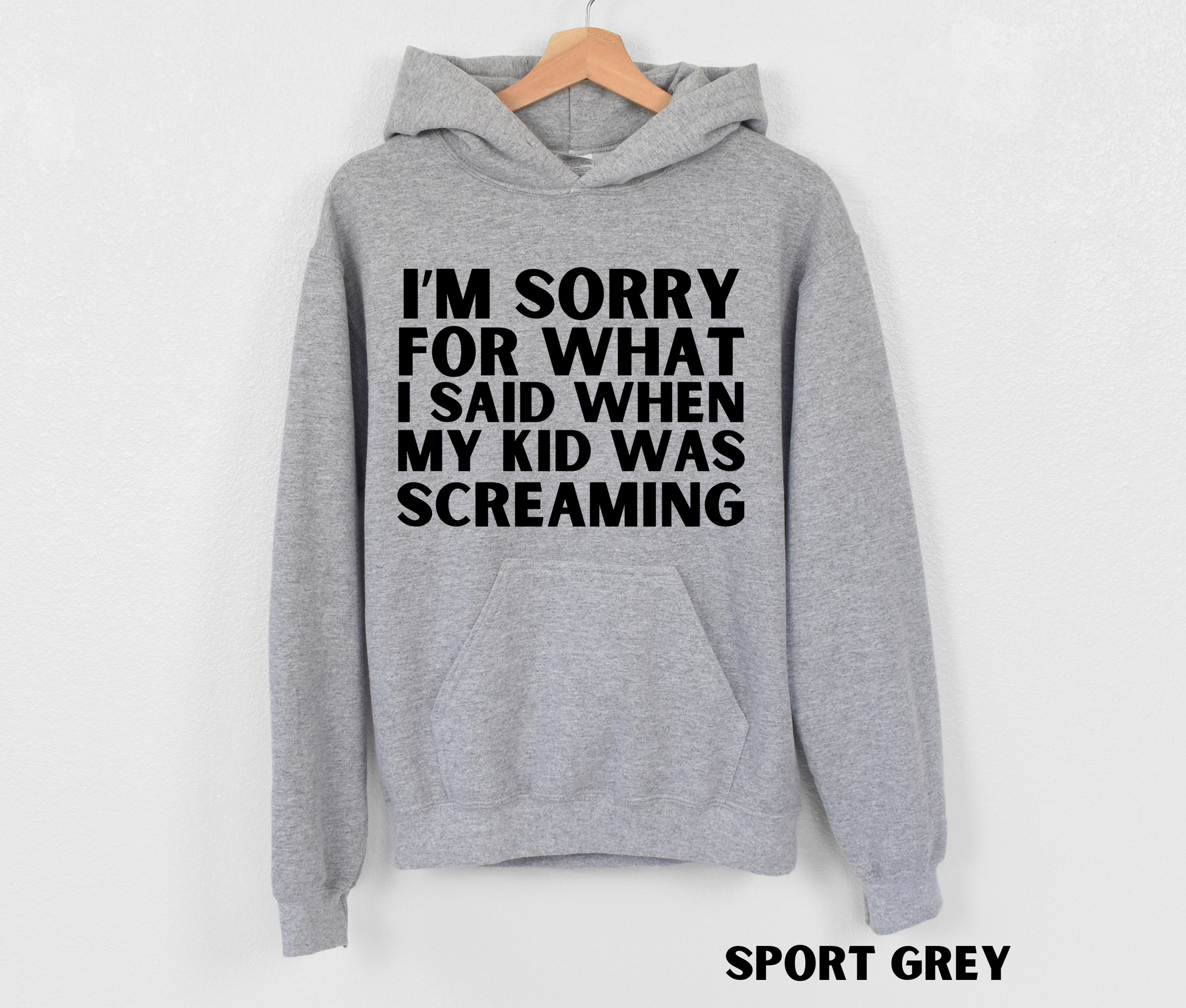 Gray funny mom hoodie with the text "I'm sorry for what I said when my kid was screaming" in black.